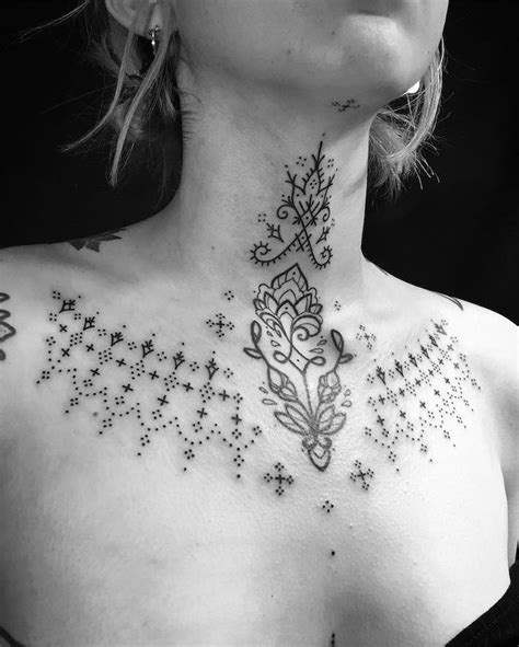 between chest tattoo female|In Between Chest Tattoos